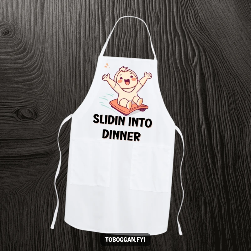 Funny apron with a cute character cheering while sliding down a gentle slope, adding humor to kitchen tasks.