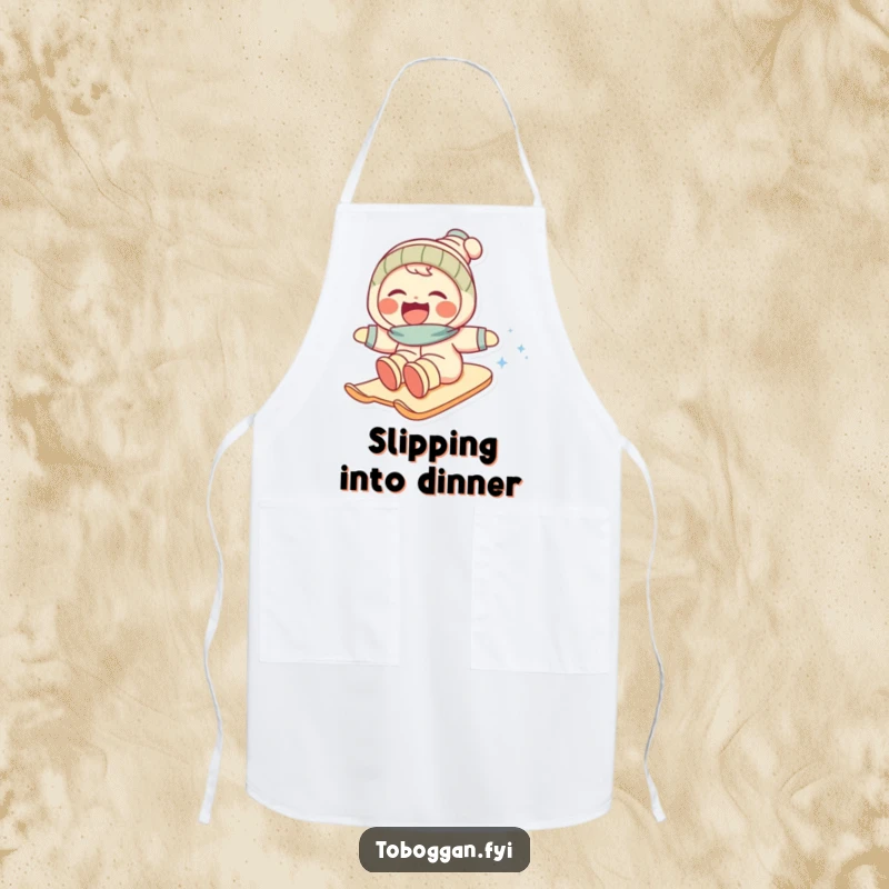 Funny apron with a character laughing gleefully while descending a snowy slope, a humorous kitchen accessory.
