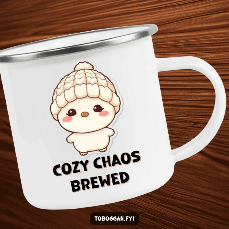 Funny camping mug featuring a character with a tiny wool hat and a mischievous grin, perfect for enjoying drinks on the go.