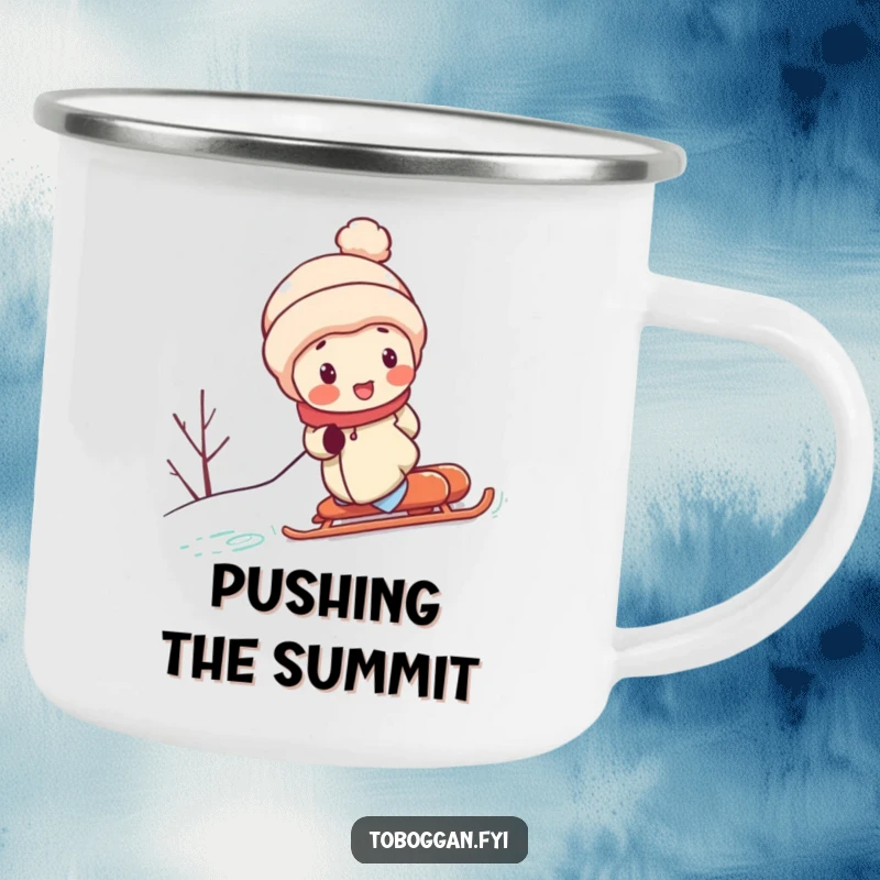 Funny camping mug shows a character with rosy cheeks, straining to push a sled uphill, a humorous representation of outdoor effort and determination.