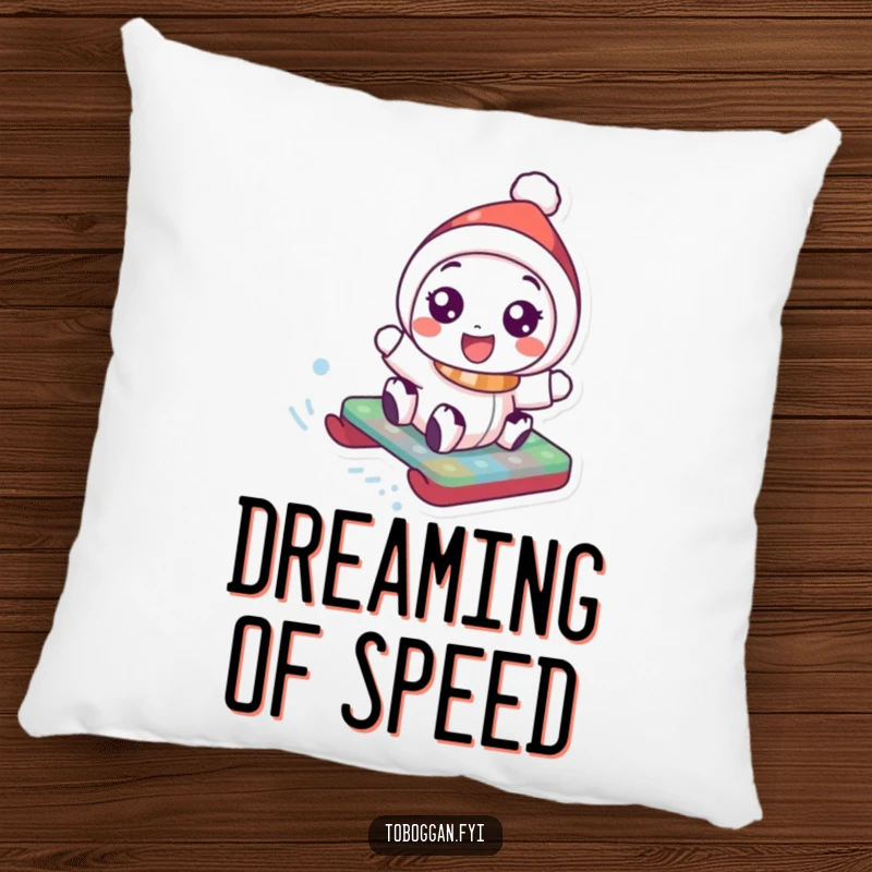 Funny Pillow: A character with ecstatic eyes and a smile enjoys a fast toboggan ride down a snowy incline, bringing cheer.
