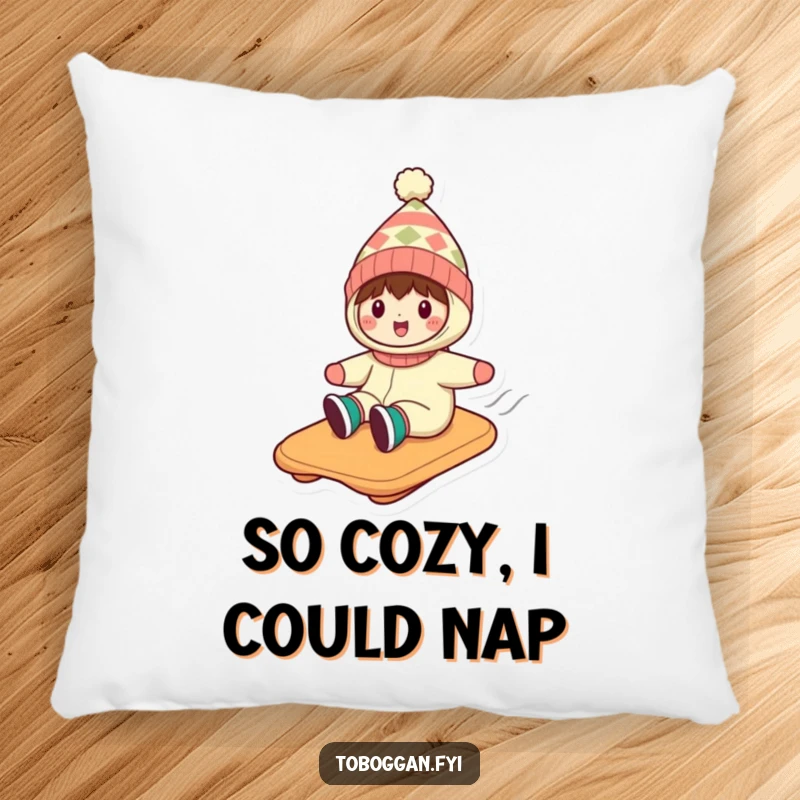 Funny pillow with a character in a silly hat, enjoying a fast toboggan ride down a snow-covered incline.