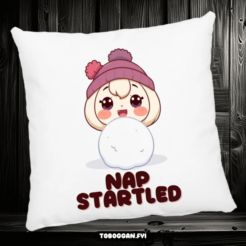 Funny pillow with a character displaying a comically surprised expression, reacting to a snowball.
