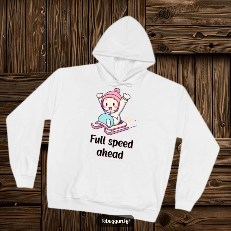 Funny Downhill Sledding Hoodie featuring a character zooming downhill on a sled with arms in the air, cozy and adventurous.