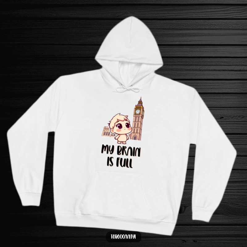 Funny hoodie showcasing a curious character on a toboggan, gazing questioningly at a gentle snowfall, perfect for winter fun.