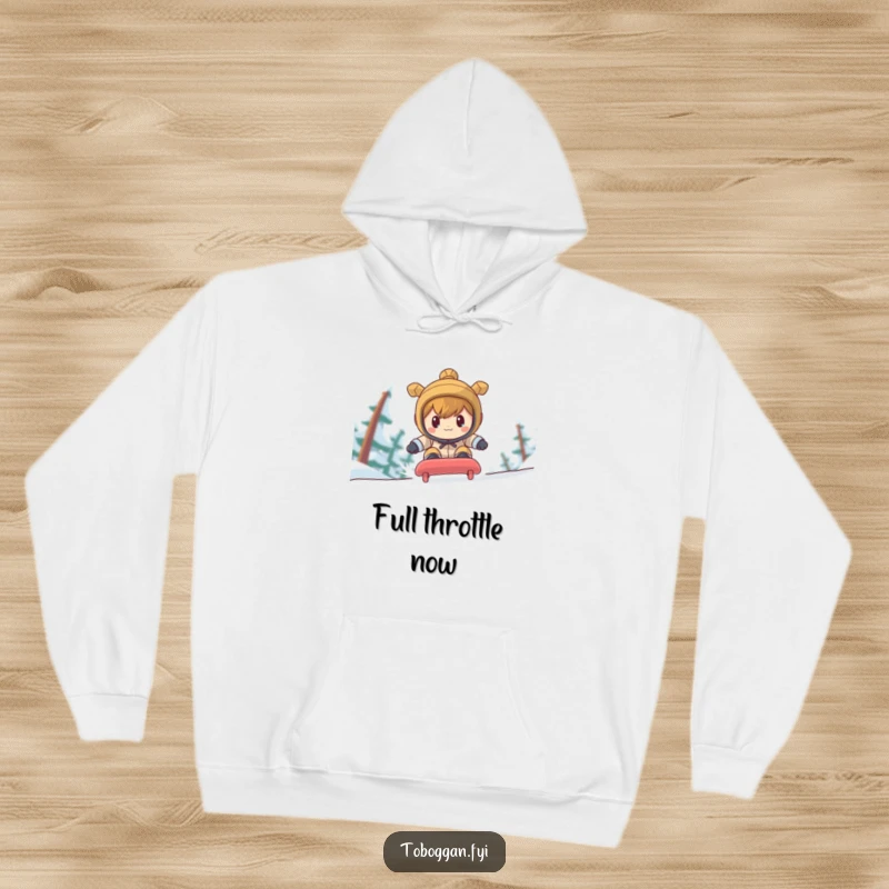 Funny character in a determined pose racing downhill on a toboggan, featured on a warm hoodie.