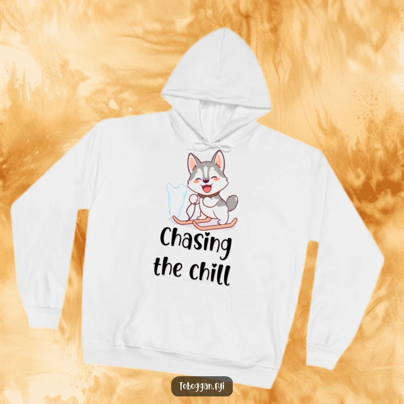 Funny hoodie showing a happy husky comically pulling a giant icicle like a sled, perfect for cozy laughs.