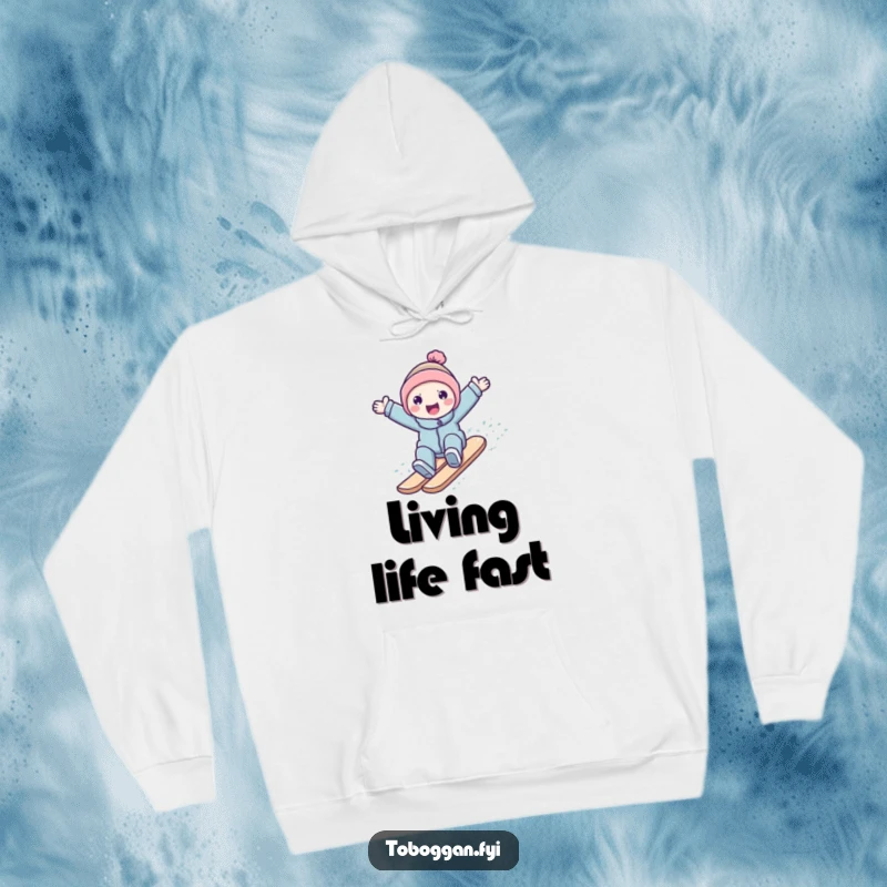 Funny character joyfully surfing down a snowy slope on a comfortable hoodie, ideal for winter.