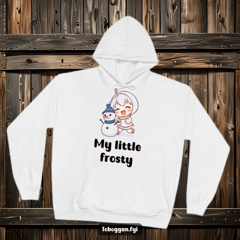 Funny hoodie featuring a character enthusiastically pushing a small snowman, perfect for snowy day adventures.