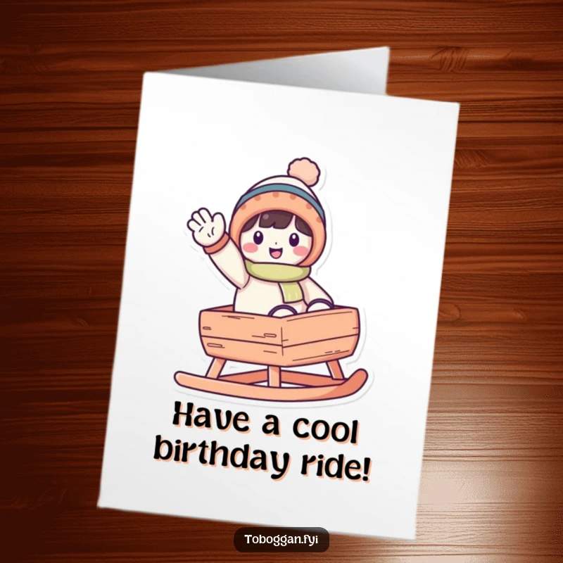 Funny Free Printable Birthday Card: A character waves happily from a toboggan, sending festive birthday greetings.