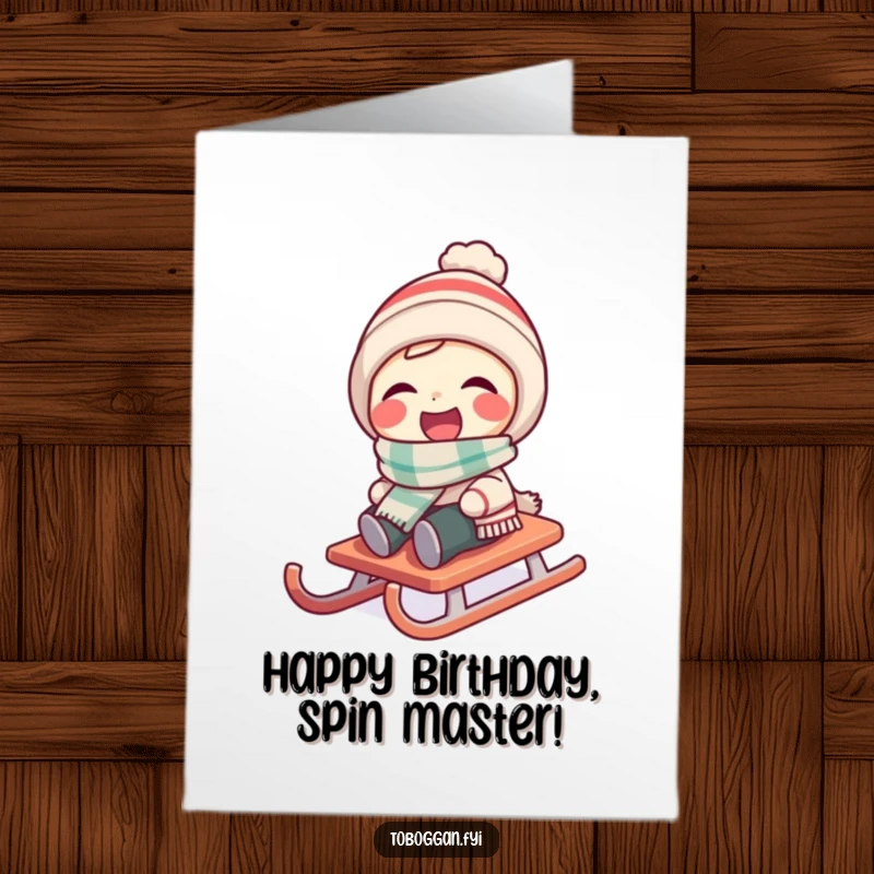 Funny Free Printable Birthday Card: Character in a scarf laughing as their sled spins wildly downhill.