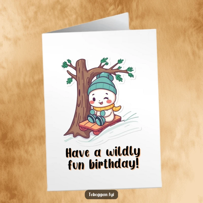 Funny Free Printable Birthday Card: A playful character cheekily steering a toboggan around a tree, full of birthday fun and humor.