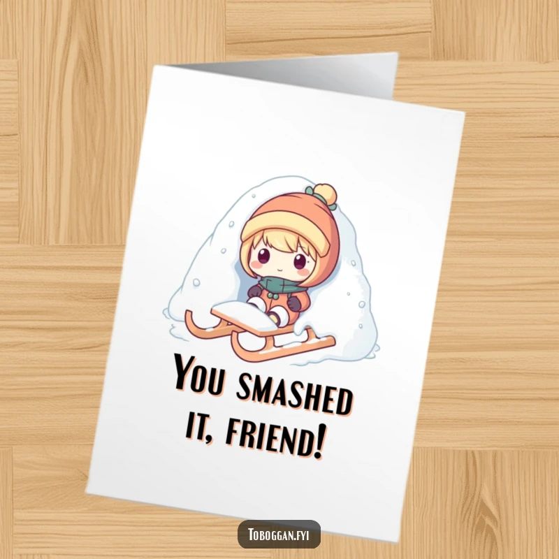 Funny free printable congratulations card featuring a character joyfully popping out from a snow pile on a sled.