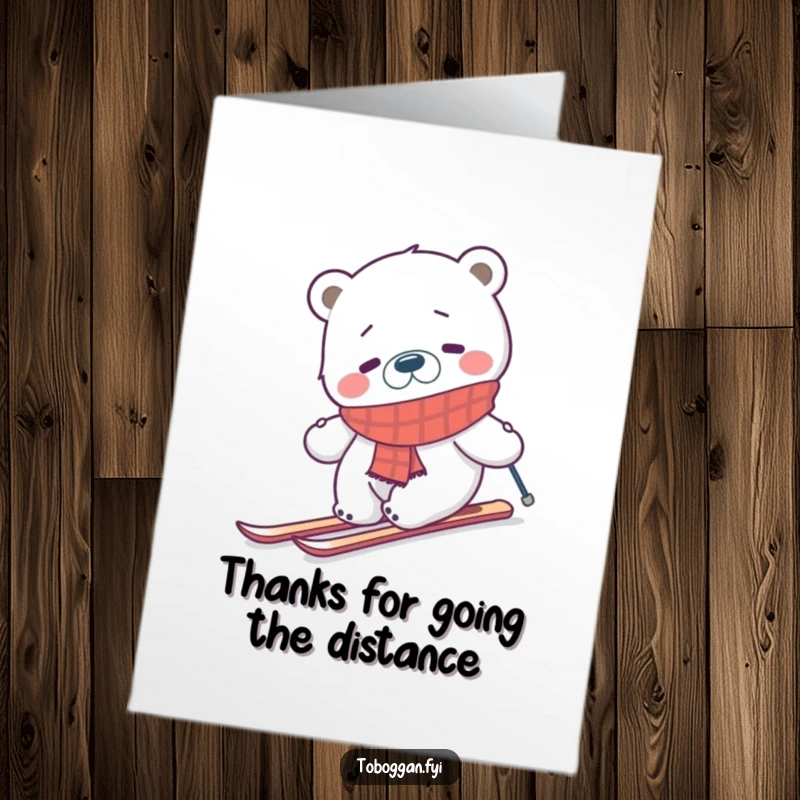Funny Free Printable Polar Bear Thank You Card: A confused bear in a scarf tries skiing uphill, expressing thanks.