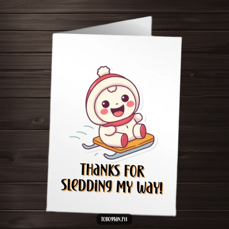 Funny Free Printable Thank You Card: Character with an infectious grin sledding down, conveying heartfelt thanks with joy.