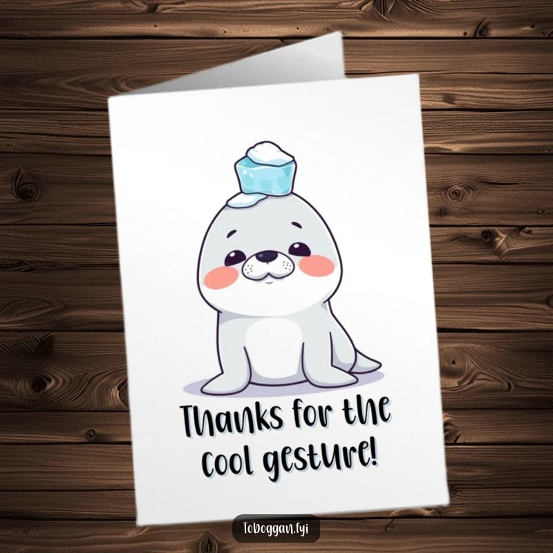 Funny Free Printable Thank You Card: A mischievous seal struggles to balance icicles on its nose, a funny downloadable message.