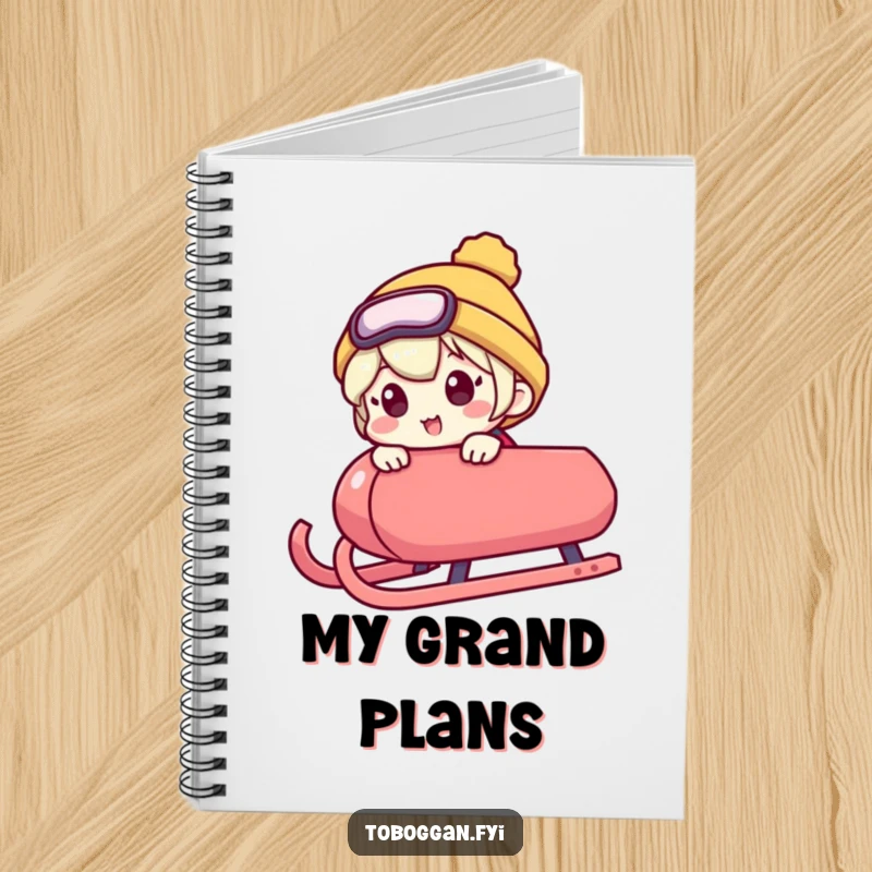 Funny notebook cover shows a character peeking over a sled's edge with an excited expression, embodying a humorous and eager readiness.