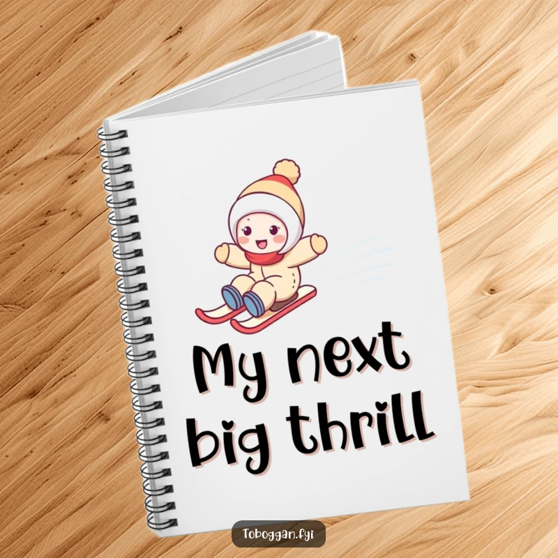 Funny notebook with a cute character joyfully zooming down a snowy hill, perfect for jotting down notes and ideas.