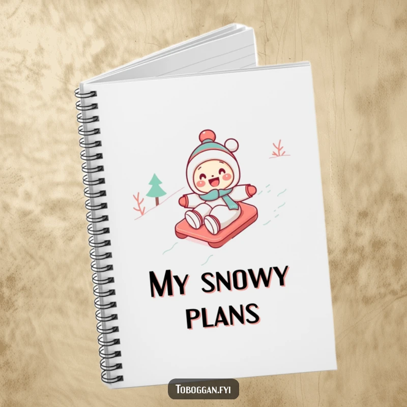 Funny Toboggan Notebook: A cute character gleefully toboggans down a snowy slope, ideal for journaling with winter humor.