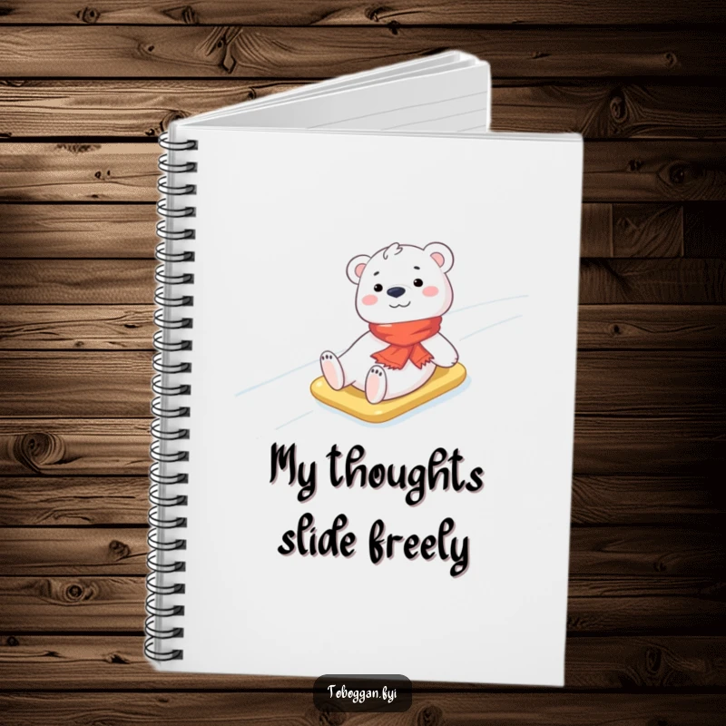 Funny Polar Bear Notebook: A cheerful polar bear cub wearing a tiny scarf is illustrated sliding down an icy slope, perfect for journaling happy thoughts.