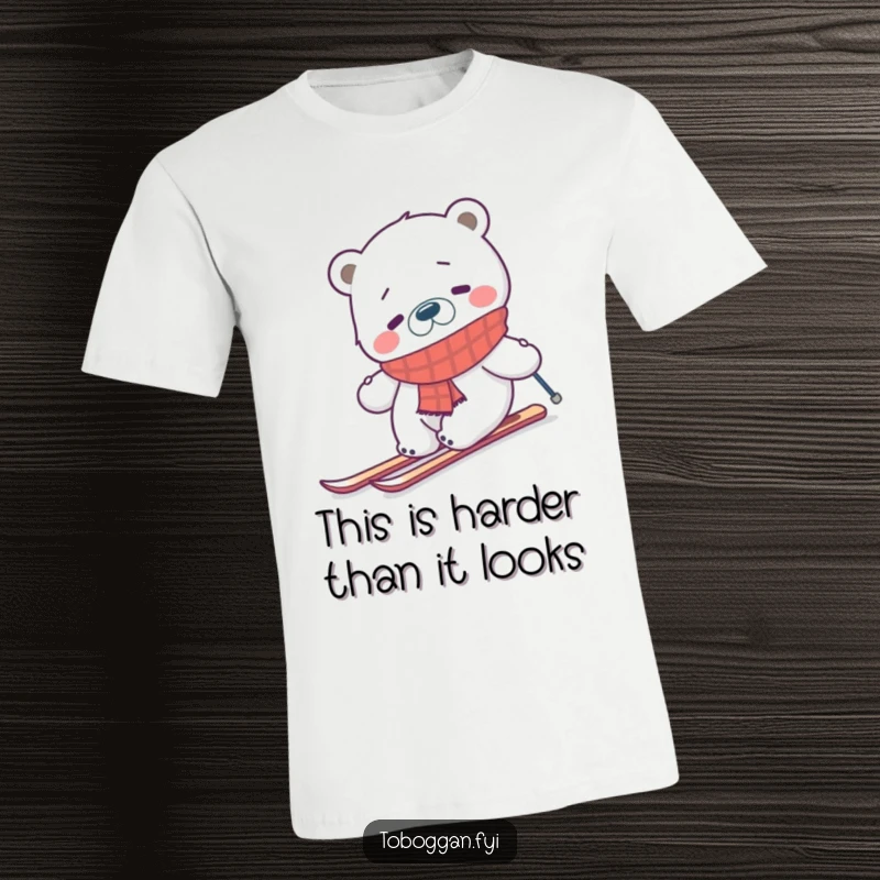 Funny confused polar bear in a scarf struggling to ski uphill on a t-shirt, ideal for winter sport lovers with a sense of humor.