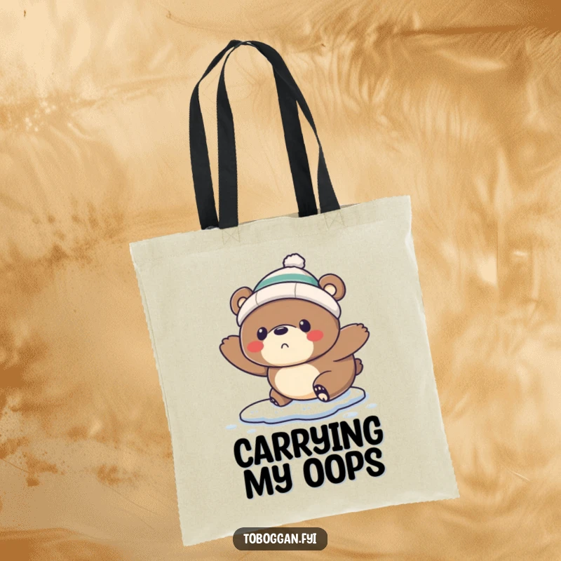 Funny Tote Bag: A startled bear wearing a tiny toque comically slips on ice, perfect for carrying your items with flair.