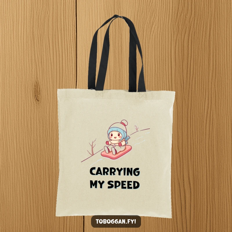 Funny tote bag with a cute cartoon character gleefully sliding down a snowy hill, illustrating a joyous winter escapade.