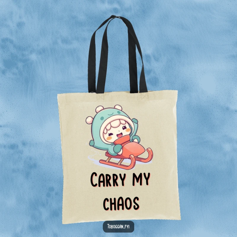 Funny falling off sled tote bag with a character making a silly expression while comically falling off a sled.