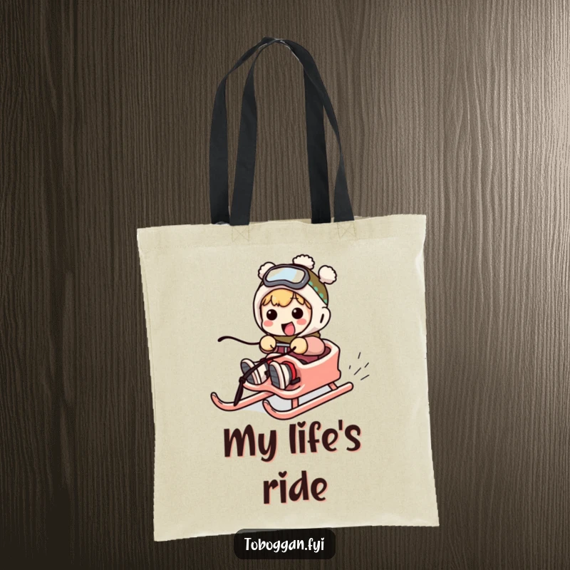 Funny tote bag with a character comically failing to steer a sled, perfect for carrying items with humor.