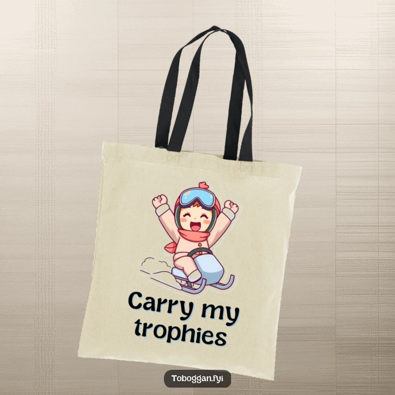 Funny sled ride tote bag featuring a character in a triumphant pose, perfect for carrying winter essentials with flair.